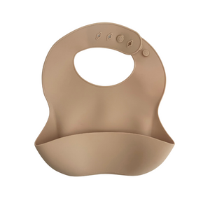 Plain cream silicone baby bib with adjustable neck snaps