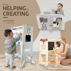 Toddler drawing on the bunny learning tower's chalkboard while a parent and another child use the fox tower nearby