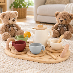Teddy bear tea party with the silicone tea set on a play rug