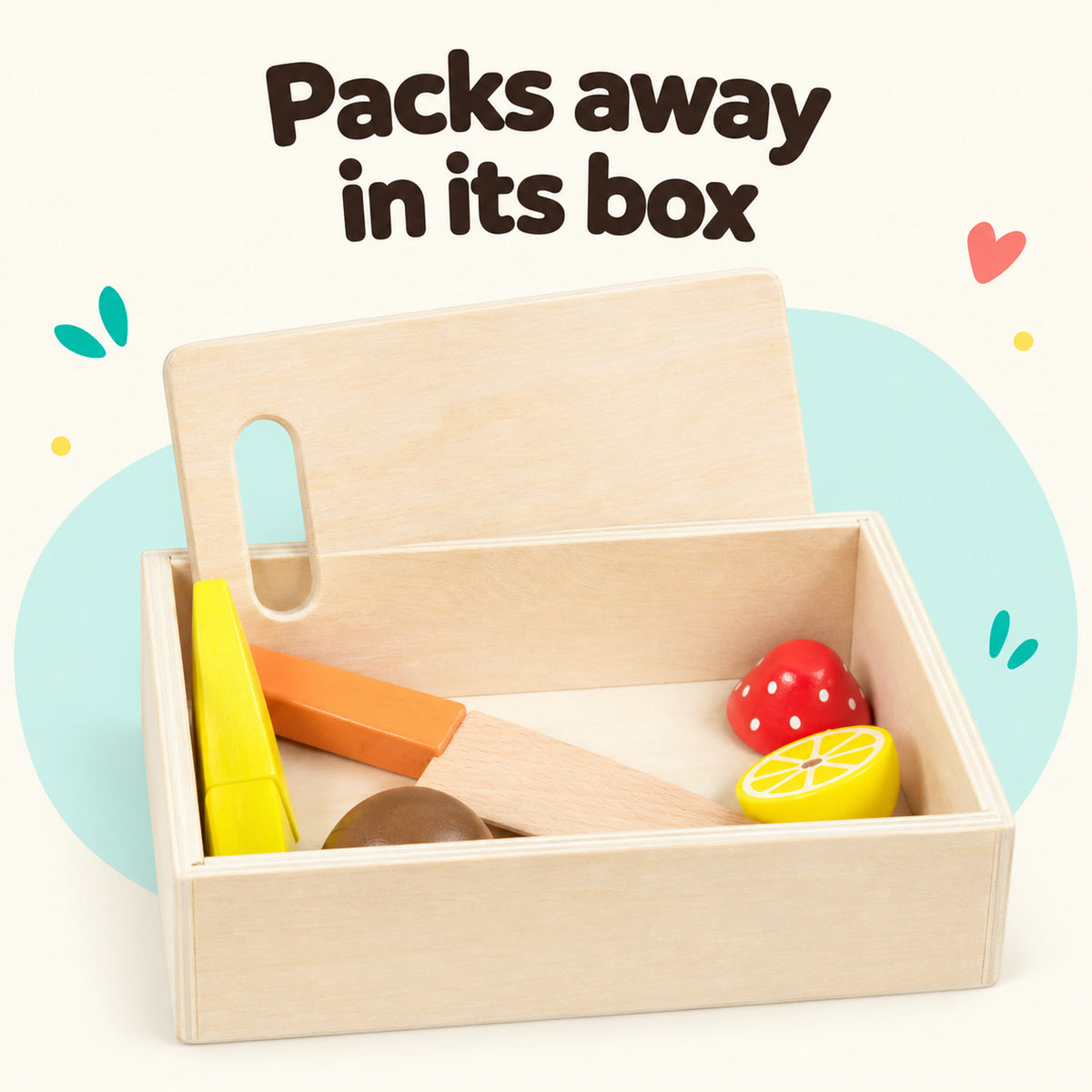 Wooden play food pieces packed away in a wooden storage box